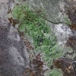 Tsavorite in matrix in No. 2 tunnel, Scorpion Mine, Kenya.