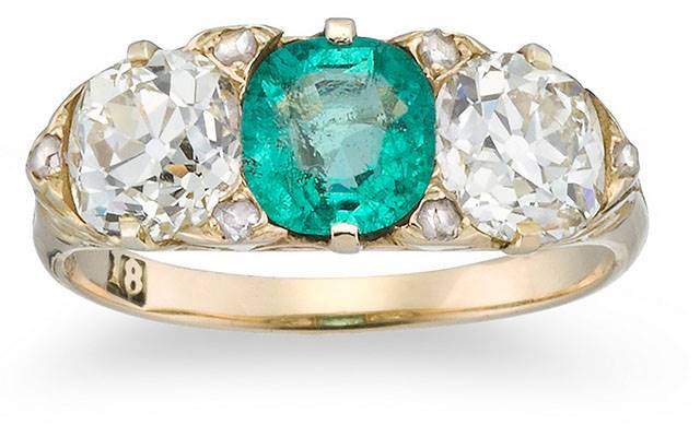 An antique emerald and diamond ring set in yellow gold formed part of the Kozminsky auction. Image courtesy: Leonard Joel