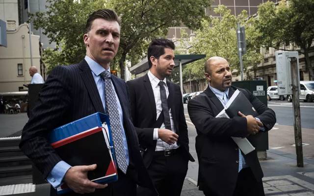 Alejandro Mendieta Blanco (centre, pictured in 2018) has pleaded guilty to a single count of receiving stolen goods. Image credit: The Age