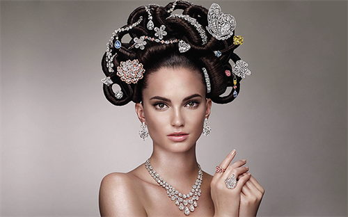 Graff Diamonds recreates its iconic 1970s campaign for its 60th anniversary in 2013. Model Dalia Gunther had her hair bejewelled with over US$500 million of Graff's most precious creations at his London headquarters. In amongst the 22 spectacular pieces is also a 52.73-carat vivid yellow diamond r