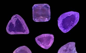 The fancy yellow diamonds – unearthed by India Bore Diamond Holdings – display a rare purple fluorescence. 