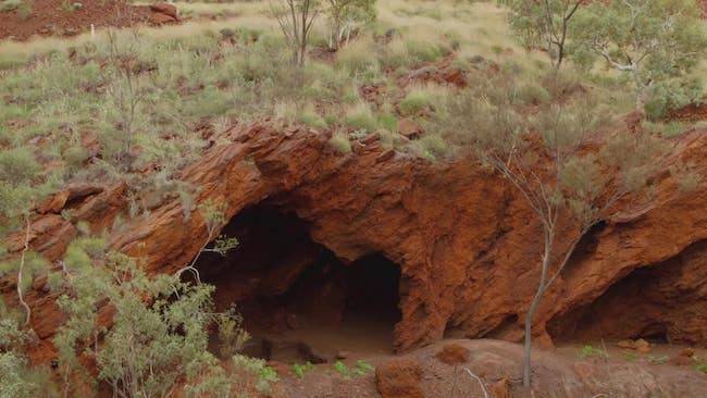 Jean-Sebastien Jacques, CEO Rio Tinto, will leave the company alongside two other executives in the wake of the Juukan Gorge demolition, which saw historically and culturally significant caves (above) destroyed to expand an iron ore mine.