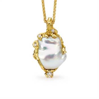 Hand carved pearl & diamond pendant by Alan Linney