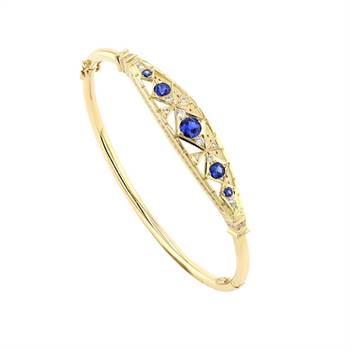 Blue sapphire & diamond bangle by Martin Farkas.