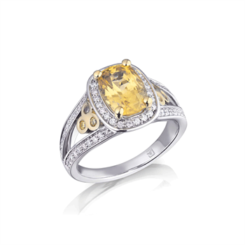 Sri Lankan yellow sapphire halo ring by John Whitaker.