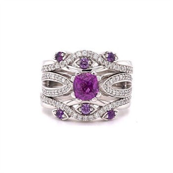 Platinum, diamond & purple sapphire ring by Bevan Jones.