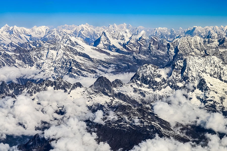 Can you spot Everest? An aerial shot of the Everest range in the Himalayan mountains.