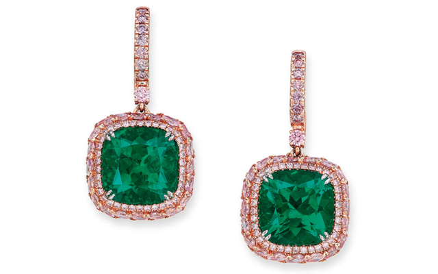 A one-of-a-kind pair of emerald earrings also broke records, fetching a final price of $US2.05 million. Image credit: Christie