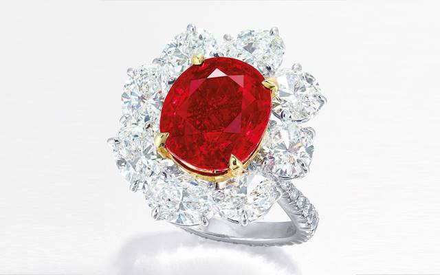 A diamond ring set with a 6.04-carat Burmese pigeon’s blood ruby, was sold for $US1.81 million. Image credit: Christie