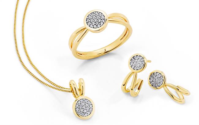 Yellow gold ring with matching earrings and pendant set with diamonds.