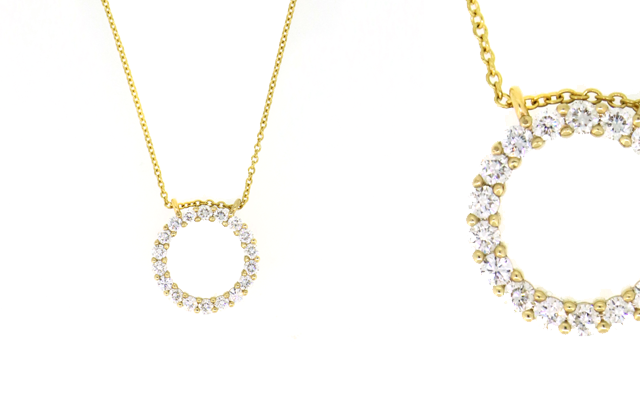 9-ct yellow gold circle pendant set with 18 brilliant-cut Biron Laboratory Grown Diamonds.