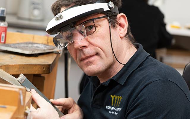 Roberto Mattei of Roberto Mattei Jewellery Design behind his bench, creating a new masterpiece.