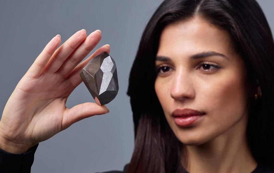 Sotheby's has announced that the 555.55-carat black diamond is one of the largest to be auctioned. Aside from the stone’s caratage, it also has 55 facets and shaped like the Middle-Eastern palm symbol Khamsa which also means “five” in Arabic. Source: michael-bowles.com