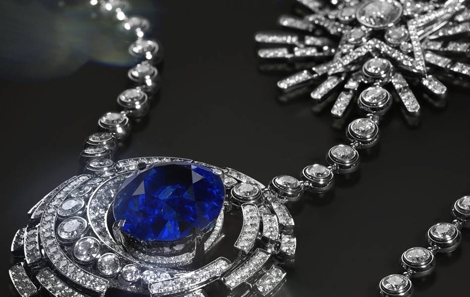 Chanel's signature piece, the Allure Céleste, evokes the night sky with bursts of star and moon motifs. The necklace is made of round-cut diamonds with a 55.55-carat intense blue oval sapphire “moon” and an 8.05-carat pear-cut diamond “comet” for its centrepieces. Source: Chanel