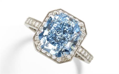 This 6.11-carat fancy-intense diamond ring sold for US$7,962,300. Source: Sotheby’s