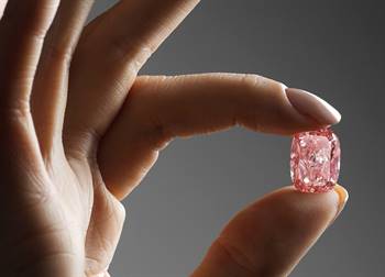 On 5 October, the 11.15-carat cushion cut fancy vivid pink diamond will be auctioned at Sotheby’s in Hong Kong with a presale estimate of $US21 million ($AU 30 million). Image: Sotheby