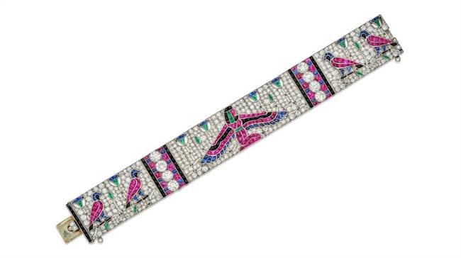 Egyptian-style bracelet designed in France in the 1920s featuring diamonds, rubies, sapphires, emeralds and black onyx