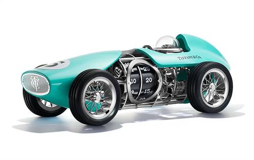 Tiffany & Co. limited edition $40,000 car-shaped clock inspired by 1950s Vintage Racers, featuring a one-carat diamond at the centre of each wheel.