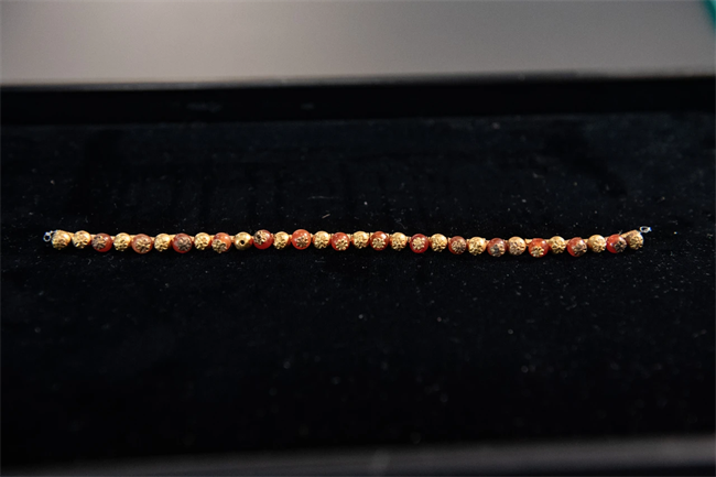 The museum has pledged to return the necklace, which was believed to have been stolen in 1976.