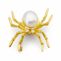 Pearl and diamond spider pendant.