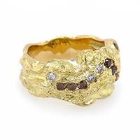 Gold ring encrusted with diamonds.