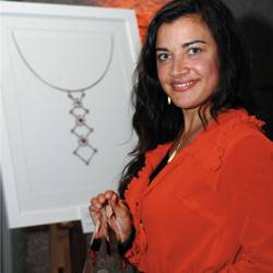 Winner of the 2008 Diamond Design Award, Alison Page flashes her trophy. 