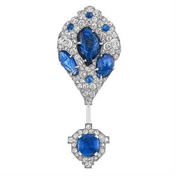 Cartier platinum, carved sapphire, diamond jabot, 1925