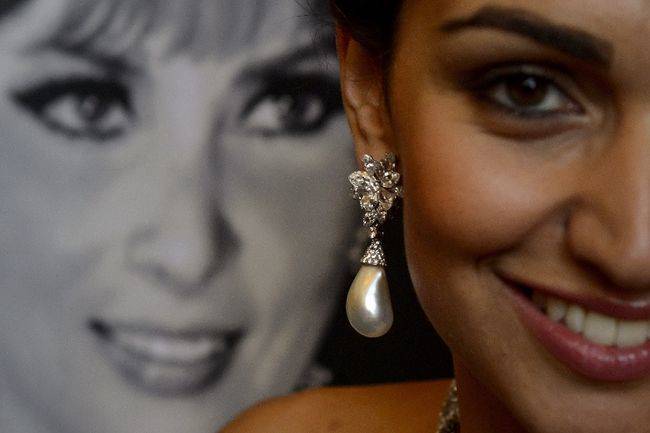 Modelled here are Gina Lollobrigida’s pearl earrings which sold for CHF 2.3 million