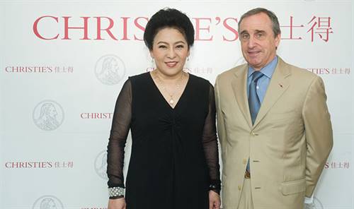 Star Entertainment vice chairman, Tiffany Chen wearing the Star of China with François Curiel of Christie