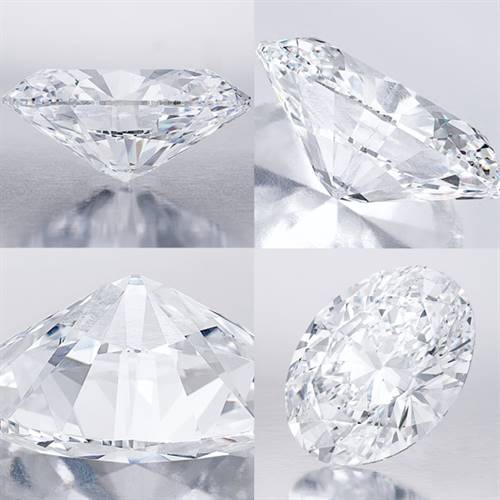 The unmounted oval brilliant-cut diamond, weighing 118.28 carats, is shown in different angles