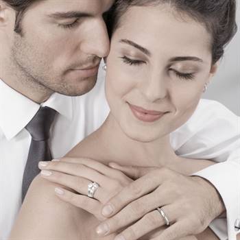 Happy couples may be burdened by the weight of expectations while buying a ring