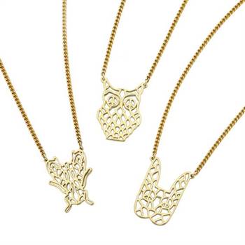 Karen Walker's filigree pendants come in the shapes of various animals