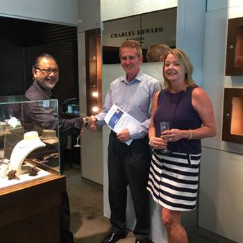 (L-R) Charles Edwards Jewellers managing director Edward Eramanis with winners John and Sharon Devitt