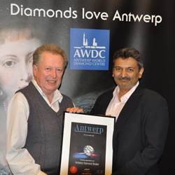 Paul Ward, Nationwide's member of the year receiving his certificate from Nishit Parikh