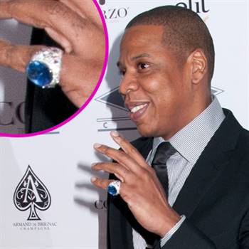 Jay-Z sporting a 500K sapphire ring, reportedly a 'push present' from his wife.