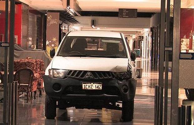 The suspect reportedly drove this car through the shopping centre before ramming into the Michael HIll jewellery store. Source: ABC News/Twitter