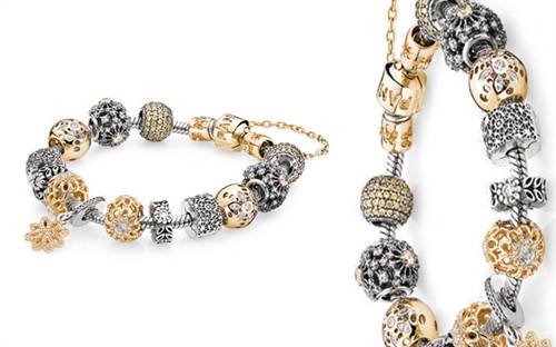 Pandora's sterling silver and gold charm bracelet