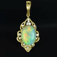 Crystal opal gold pendant with diamonds