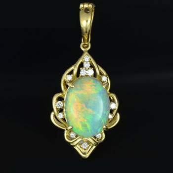 Crystal opal gold pendant with diamonds