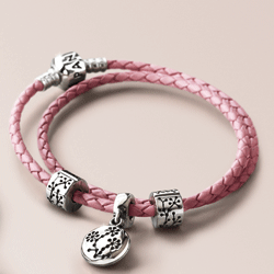 The Pandora double pink leather strap charm bracelet