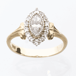 Temelli Jewellery's 9ct yellow and white gold marquise cut-cubic zirconia dress ring. It was an engagement dress ring which was then replaced by a joint design.